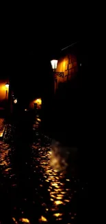 Wallpaper of a dimly lit cobblestone alley at night with warm street lights.