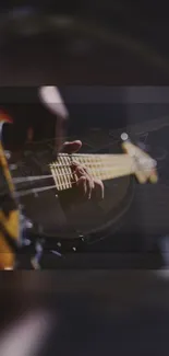 Dark guitar strings with artistic moody lighting.