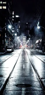 Moody night city street wallpaper showcasing urban architecture.