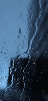 Moody mobile wallpaper with raindrops on a window in dark blue hues.