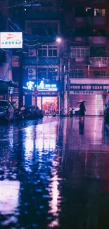 Moody urban street with neon reflections at night.