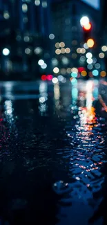 City lights reflecting on wet street at night.