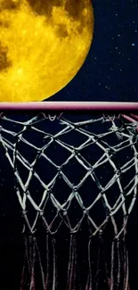 Full moon over basketball hoop with starry night background.