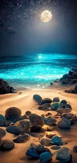 Moonlit beach with glowing water and rocks under a starry night sky.