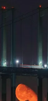 Dark bridge with moonset creating a glowing night scene.