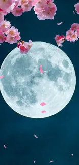 Moon with cherry blossoms in night sky.