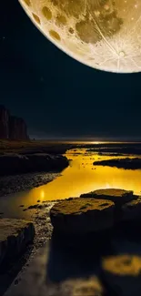 Moonlit coastal landscape with golden glow and serene reflections.