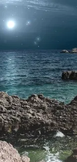 Serene moonlit night over a rocky coast and ocean.