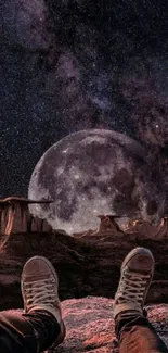 Night desert wallpaper with moon and galaxy in the background.