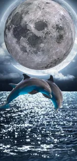 Dolphins jumping under a large moon over a shimmering ocean at night.