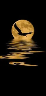 Silhouette of a bird flying over a reflective moonlit lake at night.