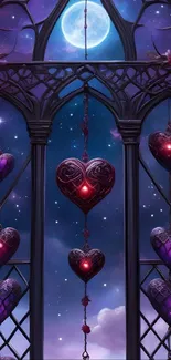 Heart ornaments hanging in moonlit sky through gothic window.