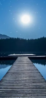 Moonlit lake with serene night sky and calm water reflection.