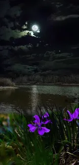 Moonlit lake with purple flowers and dark sky.