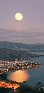 Moonlit cityscape with lakeside view and mountains under a full moon.