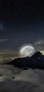 Moonlit mountain under a dark starry night sky.