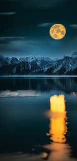 Full moon over mountain lake with reflection.