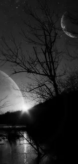 Black and white landscape with moonlit night scene over a river and silhouette trees.