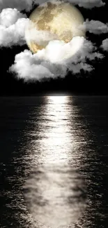 Full moon reflecting on ocean with clouds at night.