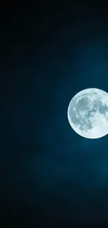 Moonlit night sky with a glowing full moon against a dark blue background.