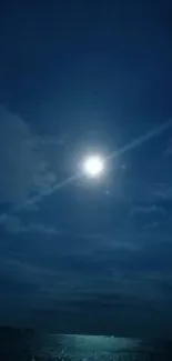 Beautiful moonlit night sky over a calm ocean.