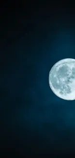 Serene night sky with a bright full moon on a dark blue background.