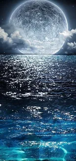 Moonlit ocean wallpaper with a full moon reflecting on night waves.