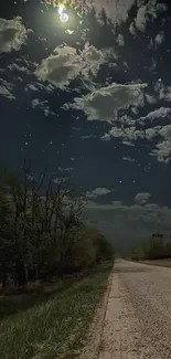 Moonlit road under a starry night sky