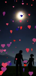 Silhouetted couple holding hands under a bright moon in a starry night sky.