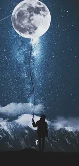 Silhouette holding moon balloon under starry sky with mountain backdrop.