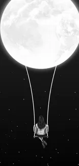 A woman swings under a large full moon in a starry black sky.