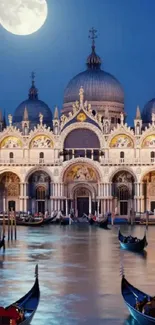 Moonlit Venice canal with gondolas and historic building.