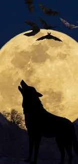 Wolf silhouette and bats against a full moon background.