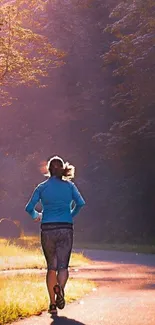 Woman jogging on a sunlit forest path, surrounded by nature.