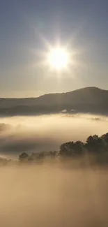 Sun rising over misty hills with soft light