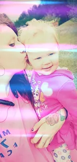 Mother kissing child with a pink glowing effect in an outdoor setting.