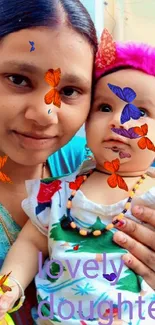 Mother cuddling baby with joyful expressions.