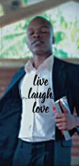 Live Laugh Love text on a blue background with a man in a suit.