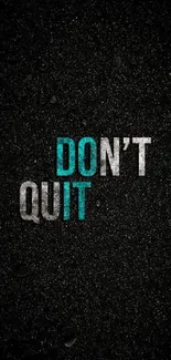 Don't Quit motivational text on dark background wallpaper.