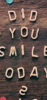 Did You Smile Today text on wood with colorful dots.