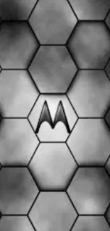 Moto wallpaper with gray hexagon pattern in a stylish geometric design.