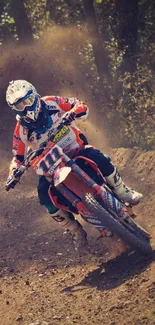 Motocross rider speeding on dusty trail with helmet and gear, amid flying dirt.