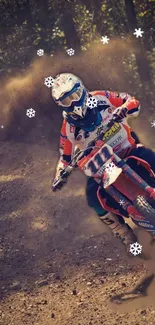 Motocross racer speeds through a dirt track with snowflakes around.