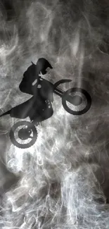 Motocross rider silhouette in smoke background wallpaper.