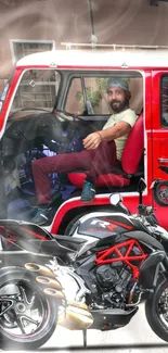 Motorbike parked beside a vintage red van with driver inside.