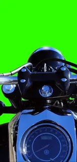 Motorbike handlebar on vibrant green background wallpaper.