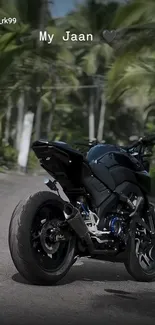 A motorcycle parked on a tropical road with lush greenery surrounding it.