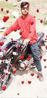 Person on motorcycle with red hearts scattered, wearing red shirt.