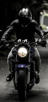 Motorcycle rider on a forest path under tree shadows.