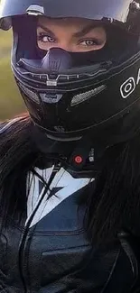 Motorcycle rider in black helmet with cat ears, silhouette view.